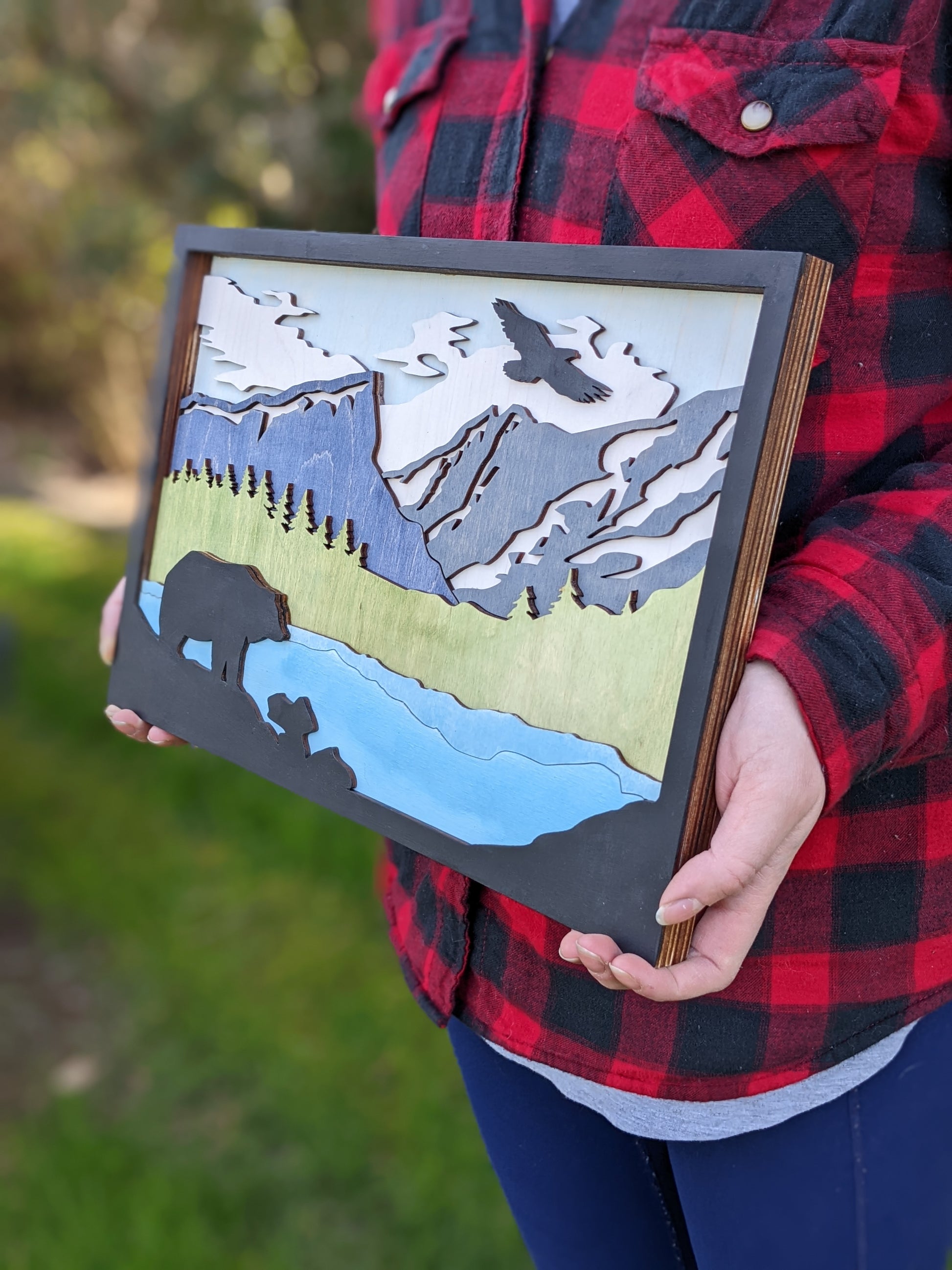 3D Layered bear, river, and mountains scene Artwork 120.00